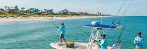 Inshore fishing scene in Myrtle Beach with anglers on a boat and scenic coastal views