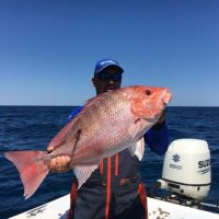 photo of Captain Keith Logan with red snapper on Deep Sea Fishing Myrtle Beach South Carolina with North Myrtle Beach Fishing Charters